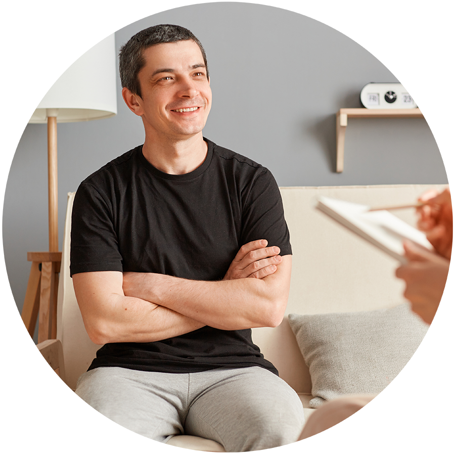 man smiling in psychotherapy help